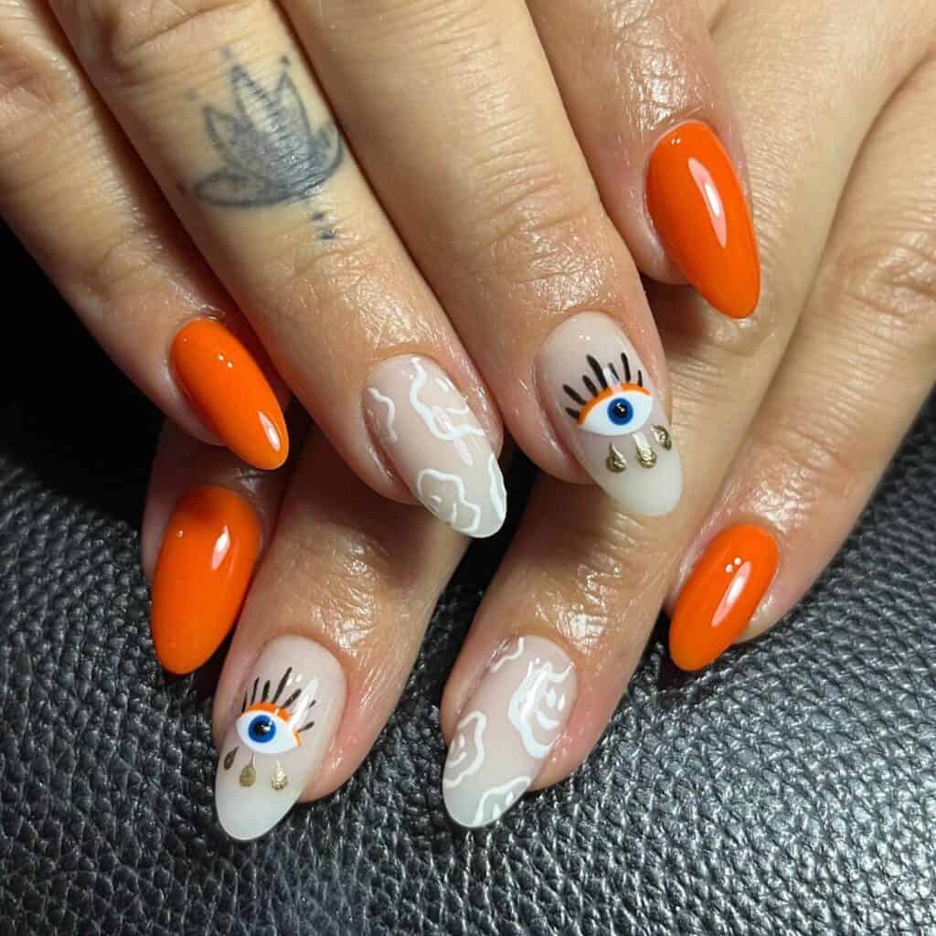 Chic summer nails featuring vibrant orange hues, from neon to burnt with glitter accents, perfect for adding a seasonal touch.