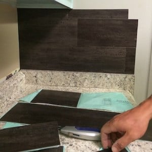 putting in vinyl flooring backsplash